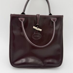 Elegant Longchamp burgundy Leather Handbag